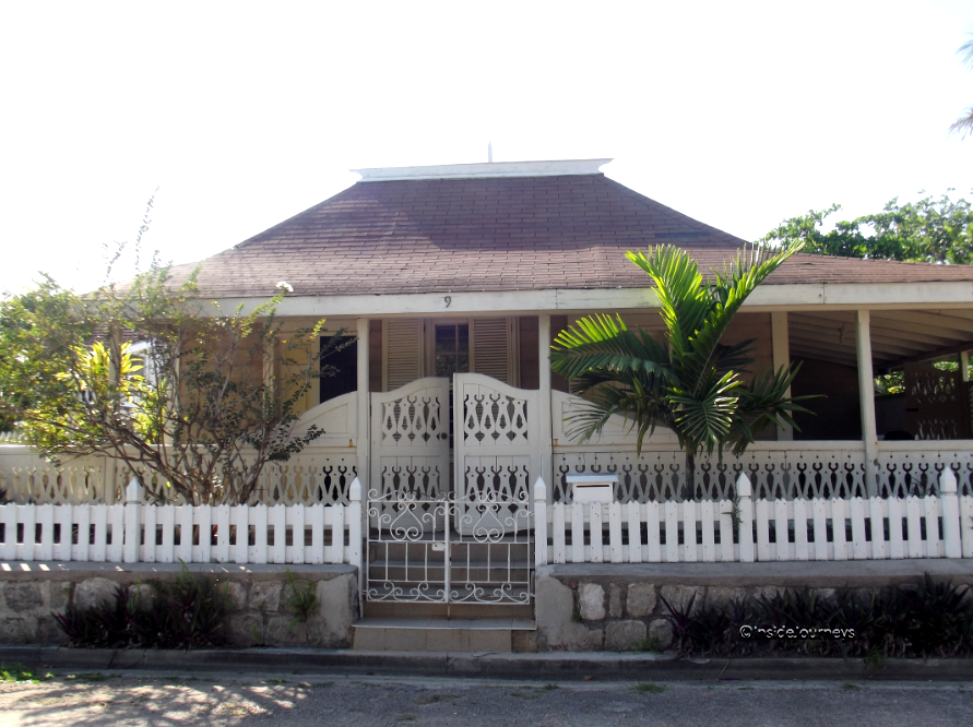 Wooden house with hip roof Wooden house with wrap-around porch