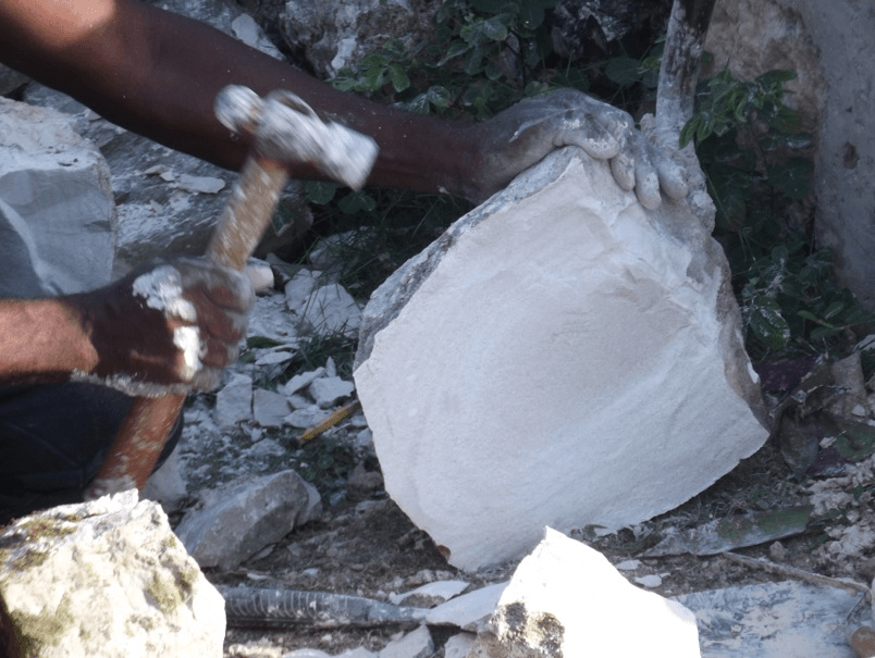 Breaking limestone rock, Falmouth Sometimes, It's All in the Hands